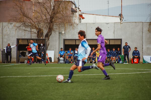 Players play a soccer match